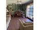 Spacious living room featuring a large window and hardwood floors at 4961 Ivey Road, Acworth, GA 30101