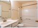 Well lit bathroom with vanity, sink, tub and shower combination and updated fixtures at 5587 Trace Views Dr, Norcross, GA 30071