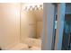 Cozy bathroom featuring a vanity with integrated sink, mirror and light fixture at 5587 Trace Views Dr, Norcross, GA 30071