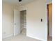 Bedroom includes a closet with built-in shelving for organized storage at 5587 Trace Views Dr, Norcross, GA 30071