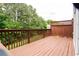 Relax on this spacious wood deck, perfect for outdoor entertaining with backyard views at 5587 Trace Views Dr, Norcross, GA 30071