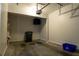 Spacious garage with shelving and ample storage space for vehicles and tools at 5587 Trace Views Dr, Norcross, GA 30071
