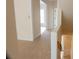 Upstairs hallway with carpet floors and white trim, offering access to other rooms at 5587 Trace Views Dr, Norcross, GA 30071