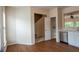 Bright eat-in kitchen with stainless appliances, hardwood floors, and staircase access at 5587 Trace Views Dr, Norcross, GA 30071