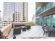 Spacious balcony with outdoor seating and city views at 1080 Ne Peachtree Ne St # 2802, Atlanta, GA 30309