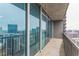 Spacious balcony showcases breathtaking city views through large, reflective glass windows at 1080 Ne Peachtree Ne St # 2802, Atlanta, GA 30309