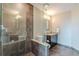 Bathroom with tiled shower and updated vanity, offering a sleek, modern design at 1080 Ne Peachtree Ne St # 2802, Atlanta, GA 30309