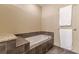 Bathroom features a tiled tub and neutral paint at 1080 Ne Peachtree Ne St # 2802, Atlanta, GA 30309