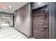 Hallway with wood-look floors leads to unit 2802 and exit at 1080 Ne Peachtree Ne St # 2802, Atlanta, GA 30309