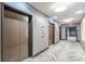 Hallway with patterned floors and elevator access at 1080 Ne Peachtree Ne St # 2802, Atlanta, GA 30309