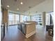 Bright kitchen and living space with stainless appliances and floor-to-ceiling windows at 1080 Ne Peachtree Ne St # 2802, Atlanta, GA 30309