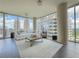 Bright living room featuring floor-to-ceiling windows and neutral-toned decor at 1080 Ne Peachtree Ne St # 2802, Atlanta, GA 30309