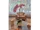 Cozy lobby space with modern chair, coffee table, and orchid arrangement at 1080 Ne Peachtree Ne St # 2802, Atlanta, GA 30309