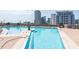 Beautiful outdoor pool with lounge seating and skyline view at 1080 Ne Peachtree Ne St # 2802, Atlanta, GA 30309