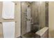 This shower features tiled walls, glass doors, rainfall showerhead, and built-in bench at 1080 Ne Peachtree Ne St # 2802, Atlanta, GA 30309