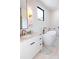 Bright bathroom featuring a soaking tub, sleek vanity, and modern finishes at 3681 Hamilton Mill Rd, Buford, GA 30519