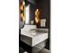 Stylish powder room featuring a marble countertop and modern lighting fixtures at 3681 Hamilton Mill Rd, Buford, GA 30519