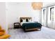 Bright bedroom with large windows, a modern bed frame, and stylish lighting fixtures at 3681 Hamilton Mill Rd, Buford, GA 30519