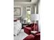 Cozy bedroom featuring plush seating, side tables, and ambient lighting at 3681 Hamilton Mill Rd, Buford, GA 30519