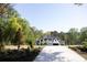 Beautiful home with a long driveway and lush landscaping at 3681 Hamilton Mill Rd, Buford, GA 30519