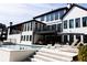 Stunning two-story home with multiple balconies and large windows, perfect for entertaining at 3681 Hamilton Mill Rd, Buford, GA 30519