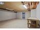Unfinished basement with concrete floors, block walls, and open ceiling at 641 Charing Cross Dr, Marietta, GA 30066