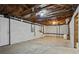 Unfinished basement with exposed ceiling, concrete floor and walls at 641 Charing Cross Dr, Marietta, GA 30066