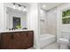 A stylish bathroom features a double vanity, soaking tub, and recessed shelf at 641 Charing Cross Dr, Marietta, GA 30066