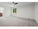 Neutral carpeted bedroom with ample natural light and generous closet space at 641 Charing Cross Dr, Marietta, GA 30066