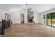 Bright living room features a vaulted ceiling, stone fireplace and sliding glass door to the deck at 641 Charing Cross Dr, Marietta, GA 30066