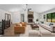 Bright living room features a vaulted ceiling, stone fireplace and comfortable furnishings at 641 Charing Cross Dr, Marietta, GA 30066