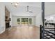 Spacious living room features a stone fireplace and seamless access to outdoor deck at 641 Charing Cross Dr, Marietta, GA 30066