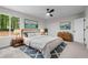 Bright main bedroom featuring calming decor, carpet floors, and natural light at 641 Charing Cross Dr, Marietta, GA 30066