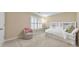 Bedroom with a built in bookshelf headboard, offering storage, and a neutral color palette for a calming sleep space at 70 Parkside Cir, Marietta, GA 30068