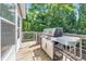 View of deck with stainless steel grill overlooking backyard at 70 Parkside Cir, Marietta, GA 30068