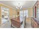 Traditional dining room featuring neutral walls, a dark wood table, and classic chandelier at 70 Parkside Cir, Marietta, GA 30068