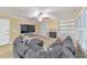 Comfortable living room with a large sectional sofa, TV, fireplace, and built-in shelves at 70 Parkside Cir, Marietta, GA 30068