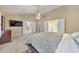 Large main bedroom with vaulted ceilings, king bed, plantation shutters, and ensuite bathroom at 70 Parkside Cir, Marietta, GA 30068