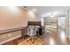 Spacious office area with dual monitors, desk space, and adjacent shelving for ample storage solutions at 70 Parkside Cir, Marietta, GA 30068