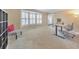 Spacious office with a bay window, neutral carpet, and equipped with dual monitors at 70 Parkside Cir, Marietta, GA 30068