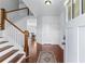 Spacious foyer with hardwood floors, stairs, and natural light at 3422 Hopi Pt, Lawrenceville, GA 30044