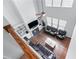 Living room with a fireplace, ceiling fan, built in shelving, and an open floor plan at 3422 Hopi Pt, Lawrenceville, GA 30044