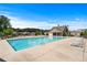 Large community swimming pool with lounge chairs and a covered pavilion at 3422 Hopi Pt, Lawrenceville, GA 30044