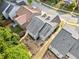 Aerial view of the property showing the roofline, backyard, and its location within a residential neighborhood at 121 Camdyn Cir, Woodstock, GA 30188
