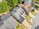 Aerial view of the home featuring its backyard, driveway, and neighborhood setting at 121 Camdyn Cir, Woodstock, GA 30188