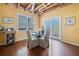Sunny dining area with hardwood floors and access to the outdoors at 121 Camdyn Cir, Woodstock, GA 30188