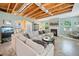 Spacious living room featuring a comfortable sectional sofa and cozy fireplace at 121 Camdyn Cir, Woodstock, GA 30188