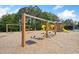 Community playground featuring swings, slides, and climbing structures for outdoor fun at 121 Camdyn Cir, Woodstock, GA 30188
