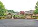 A community space with mailboxes and lush landscaping, a great place to meet your neighbors at 2771 Middlecreek Way, Cumming, GA 30041