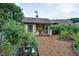 Community garden with shed, raised garden beds, and fresh vegetables at 2771 Middlecreek Way, Cumming, GA 30041
